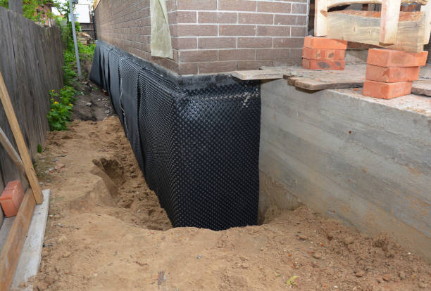 SJ Waterproofing Pros technician performing targeted Waterproofing assessment in Greenville, SC
